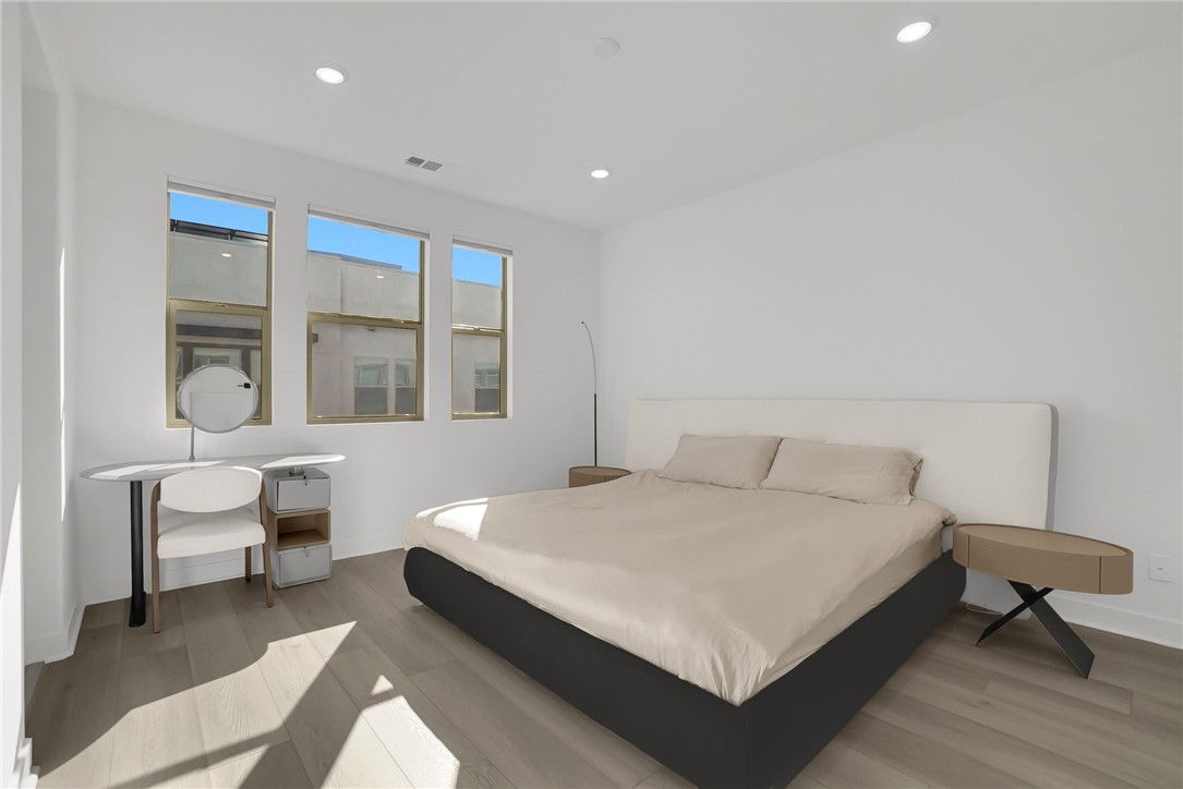 1958 Hollyleaf Terrace Montebello, CA 90640 - Photo 29 of 58 a bedroom with a bed and a table