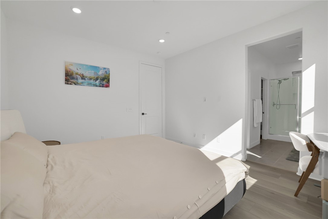 1958 Hollyleaf Terrace Montebello, CA 90640 - Photo 31 of 58 a bedroom with a bed and a table