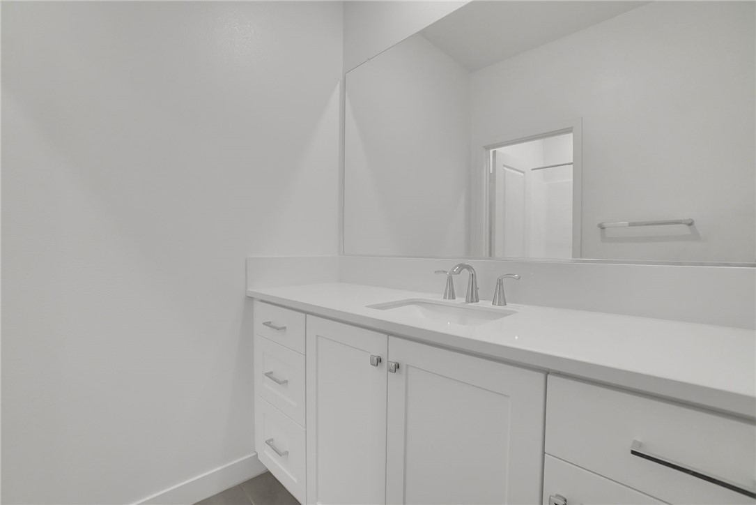 1958 Hollyleaf Terrace Montebello, CA 90640 - Photo 36 of 58 a bathroom with a sink and a mirror