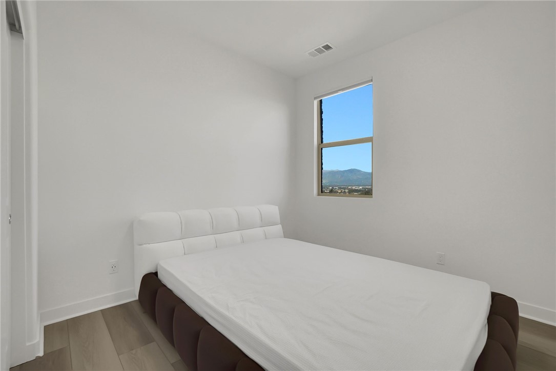 1958 Hollyleaf Terrace Montebello, CA 90640 - Photo 38 of 58 a bedroom with a bed and a window