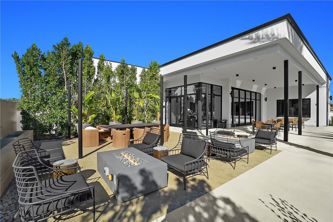 1958 Hollyleaf Terrace Montebello, CA 90640 - Photo 49 of 58 a view of a patio with couches table and chairs and potted plants