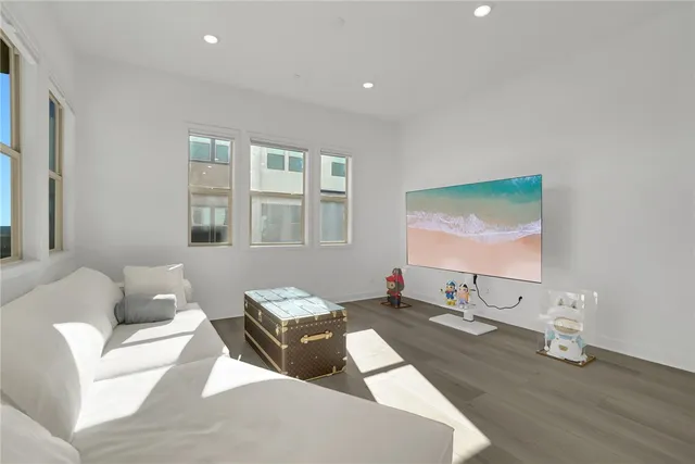 a living room with furniture and window