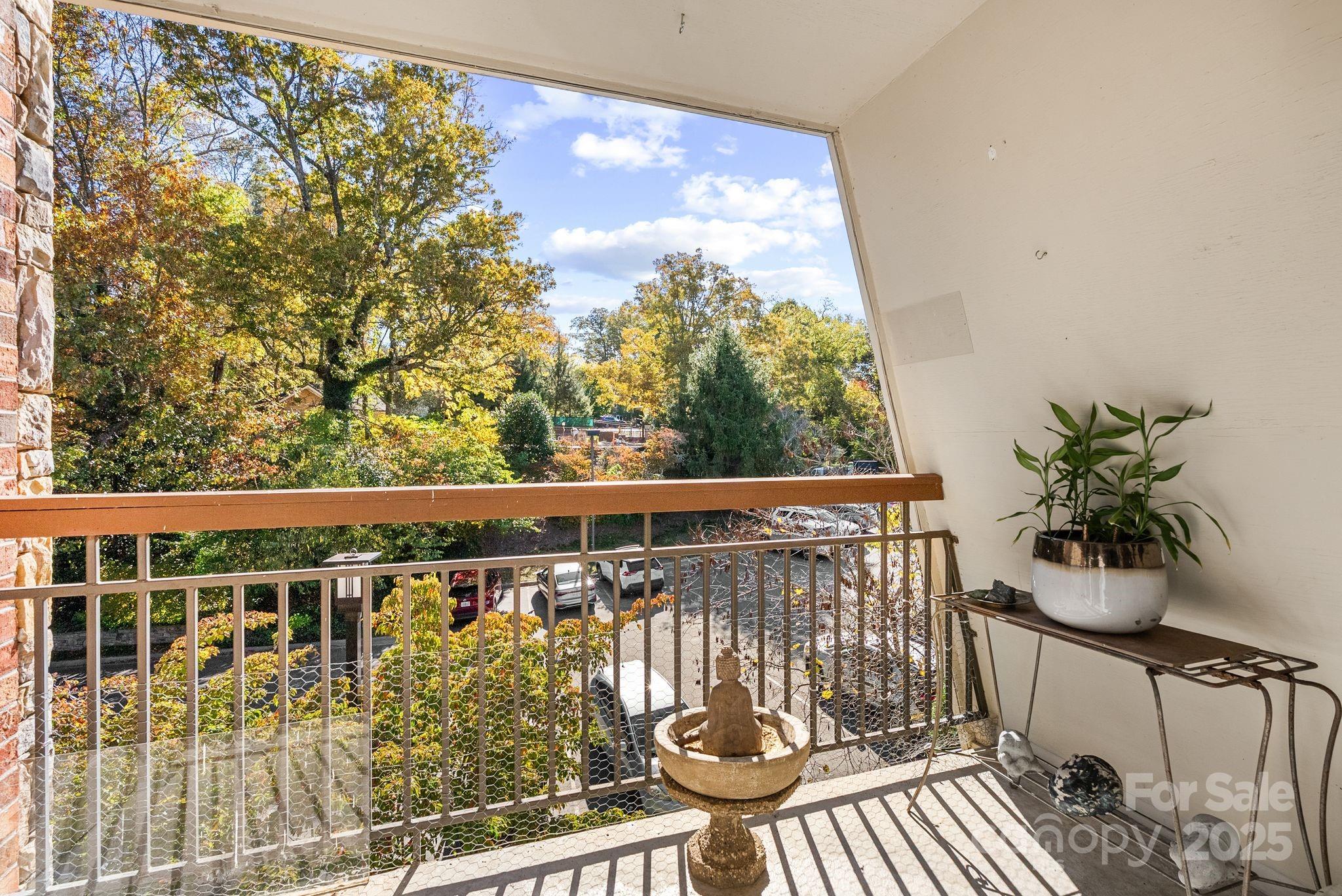 429 Bowling Park Road Asheville, NC 28803 - Photo 14 of 30 a view of balcony with furniture