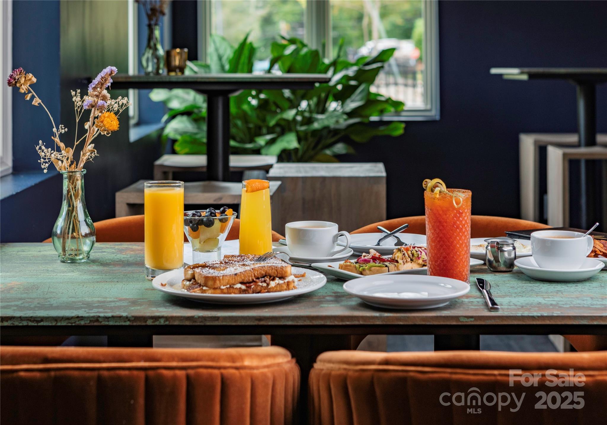 429 Bowling Park Road Asheville, NC 28803 - Photo 28 of 30 view of living room with furniture and a potted plant
