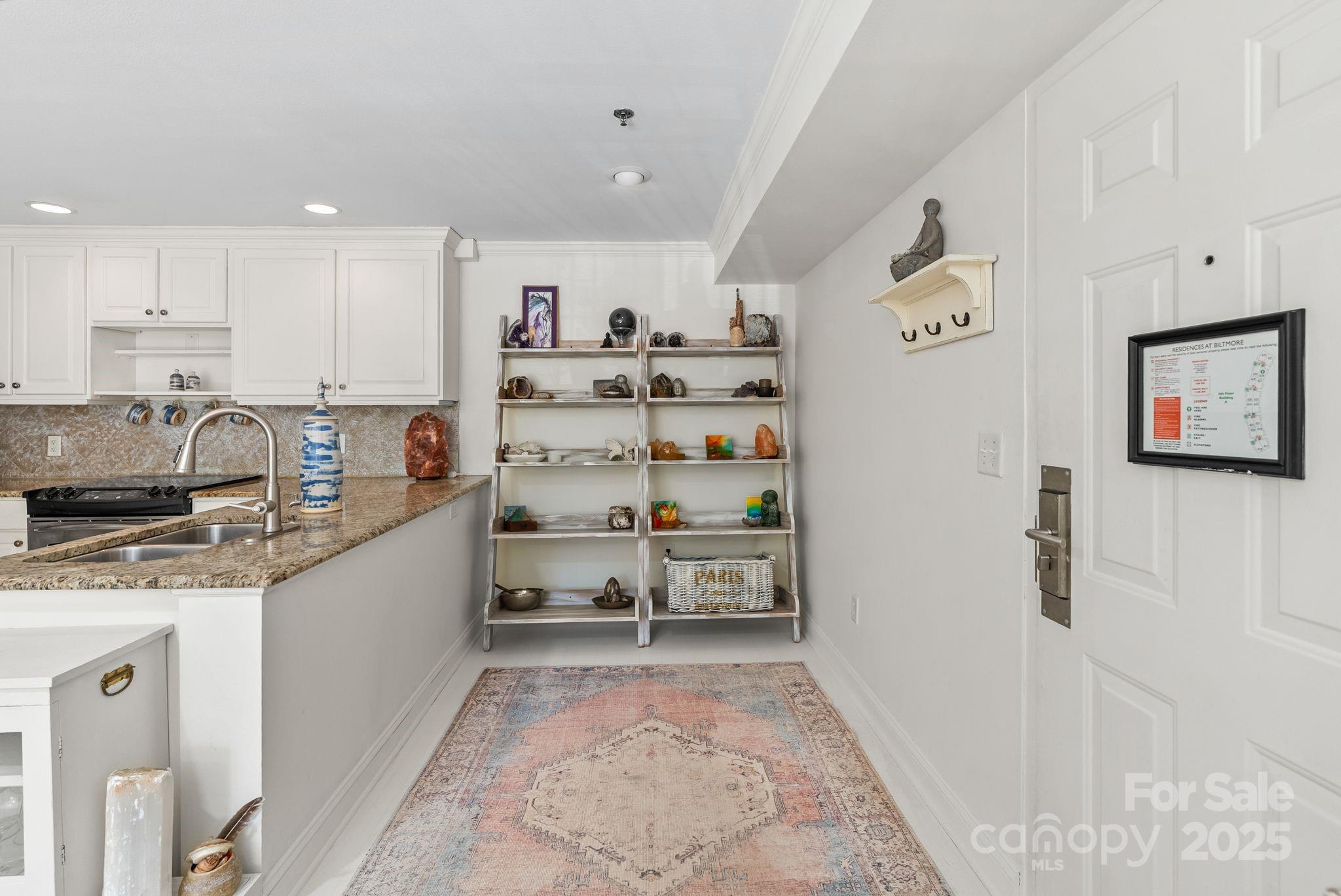 429 Bowling Park Road Asheville, NC 28803 - Photo 5 of 30 a kitchen with stainless steel appliances granite countertop a refrigerator and a sink