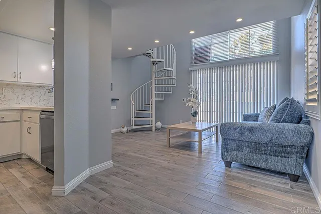 a view of a room with a large tree