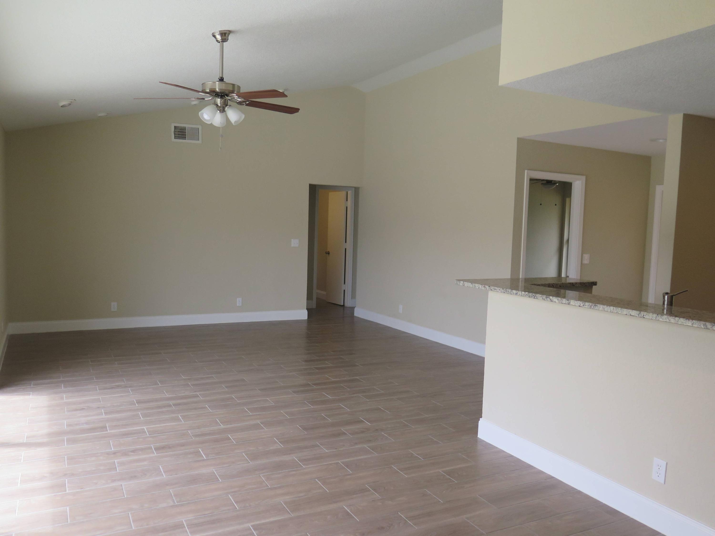 9744 Ohio Place Boca Raton, FL 33434 - Photo 8 of 20 wooden floor in an empty room