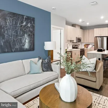 a living room with furniture and a couch