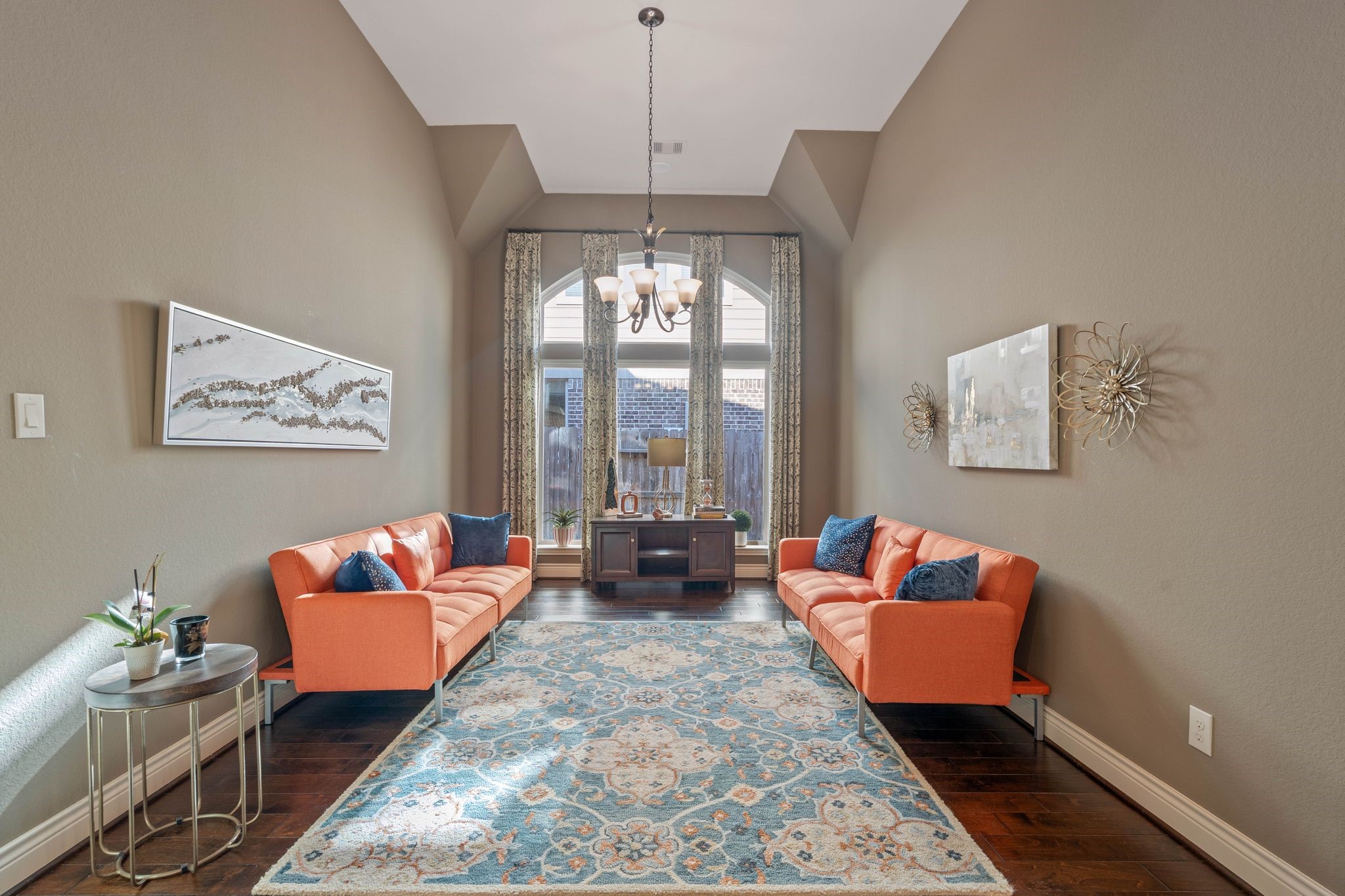 23306 Ridge Spring Drive New Caney, TX 77357 - Photo 13 of 45 a living room with furniture and a chandelier