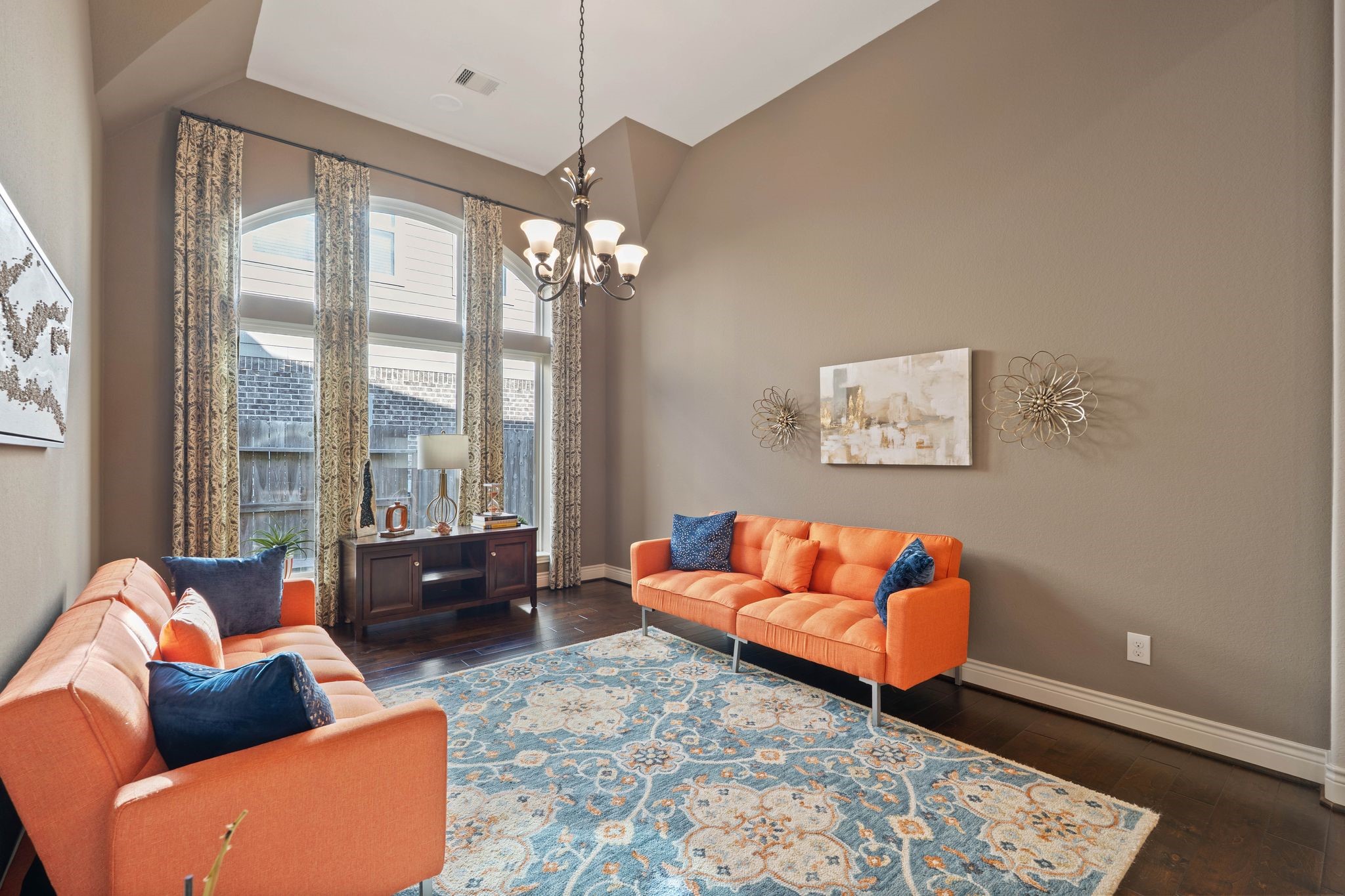 23306 Ridge Spring Drive New Caney, TX 77357 - Photo 14 of 45 a living room with furniture and a chandelier