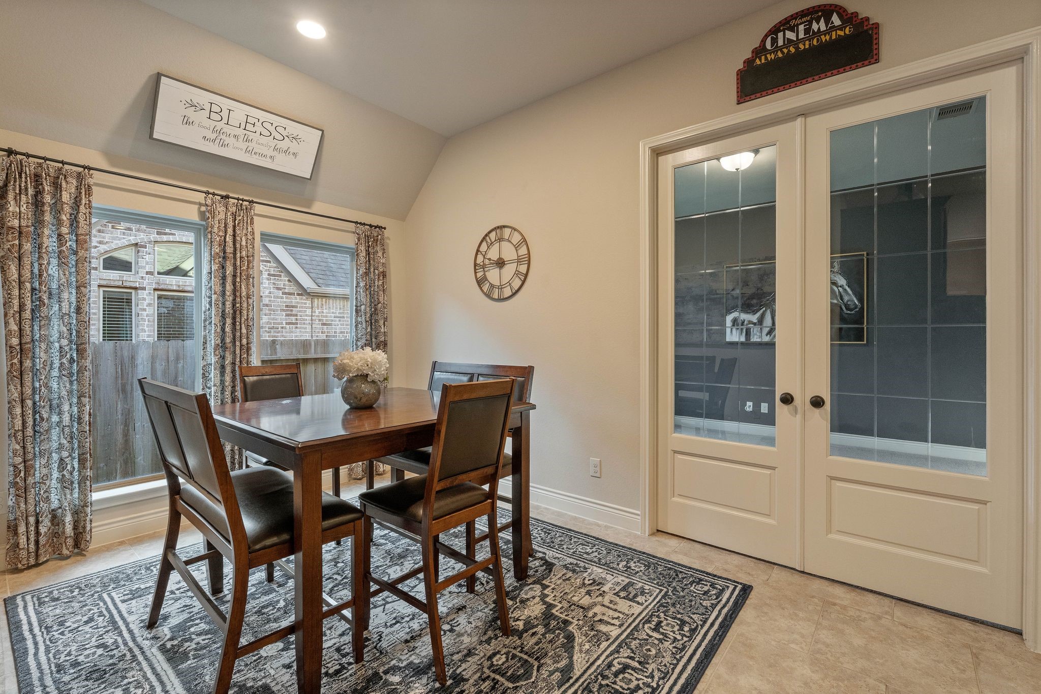 23306 Ridge Spring Drive New Caney, TX 77357 - Photo 19 of 45 a view of a dining room with furniture