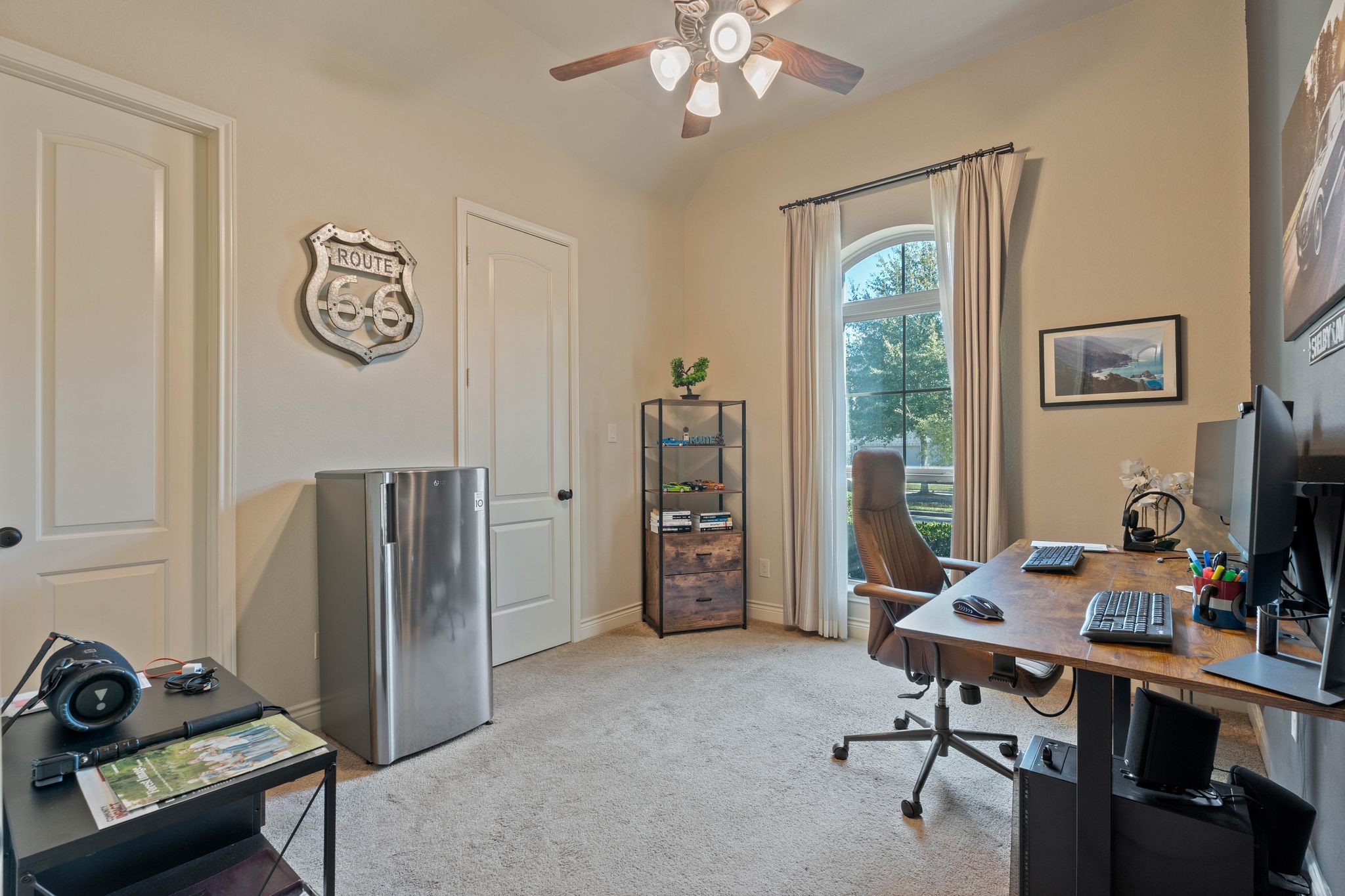 23306 Ridge Spring Drive New Caney, TX 77357 - Photo 34 of 45 a view of a workspace with furniture and a window