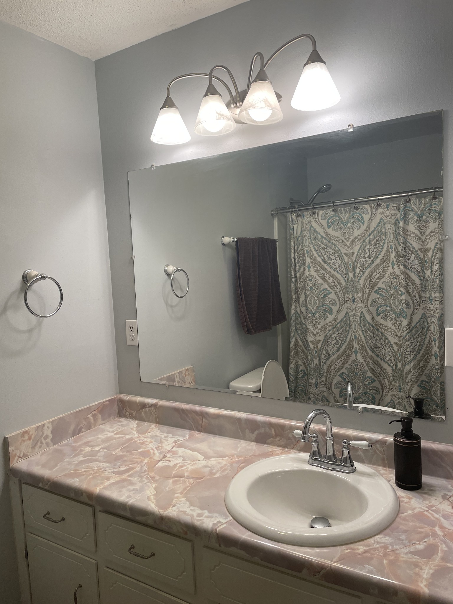 829 Dripping Springs Road Winchester, TN 37398 - Photo 15 of 32 a bathroom with a sink and a mirror