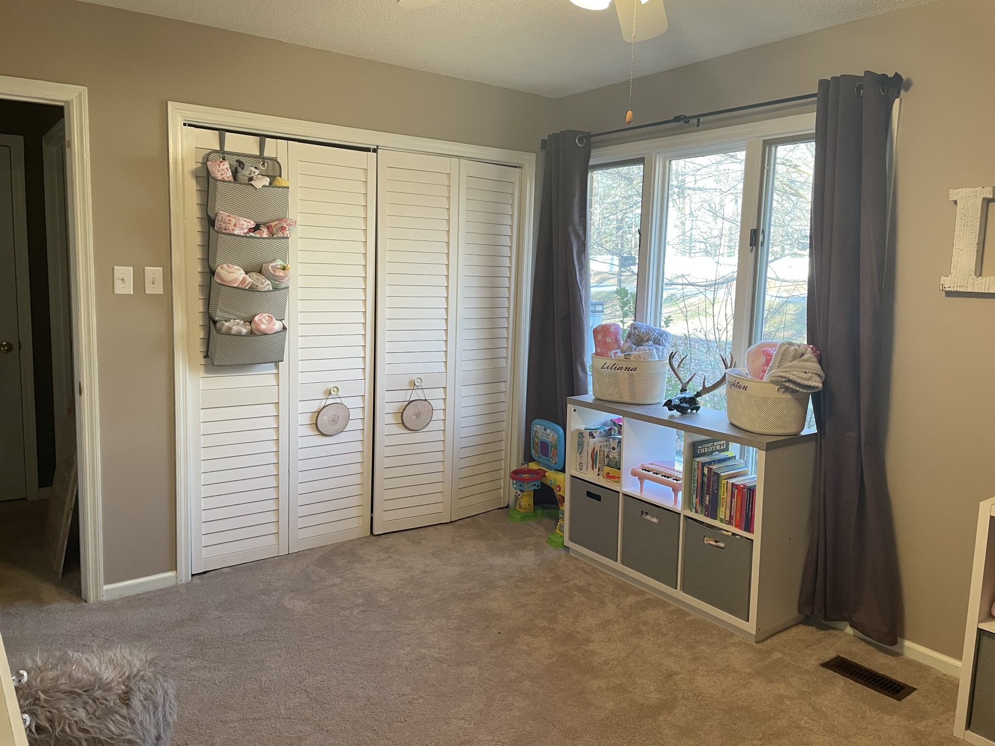 829 Dripping Springs Road Winchester, TN 37398 - Photo 18 of 32 wooden floor and windows in an empty room