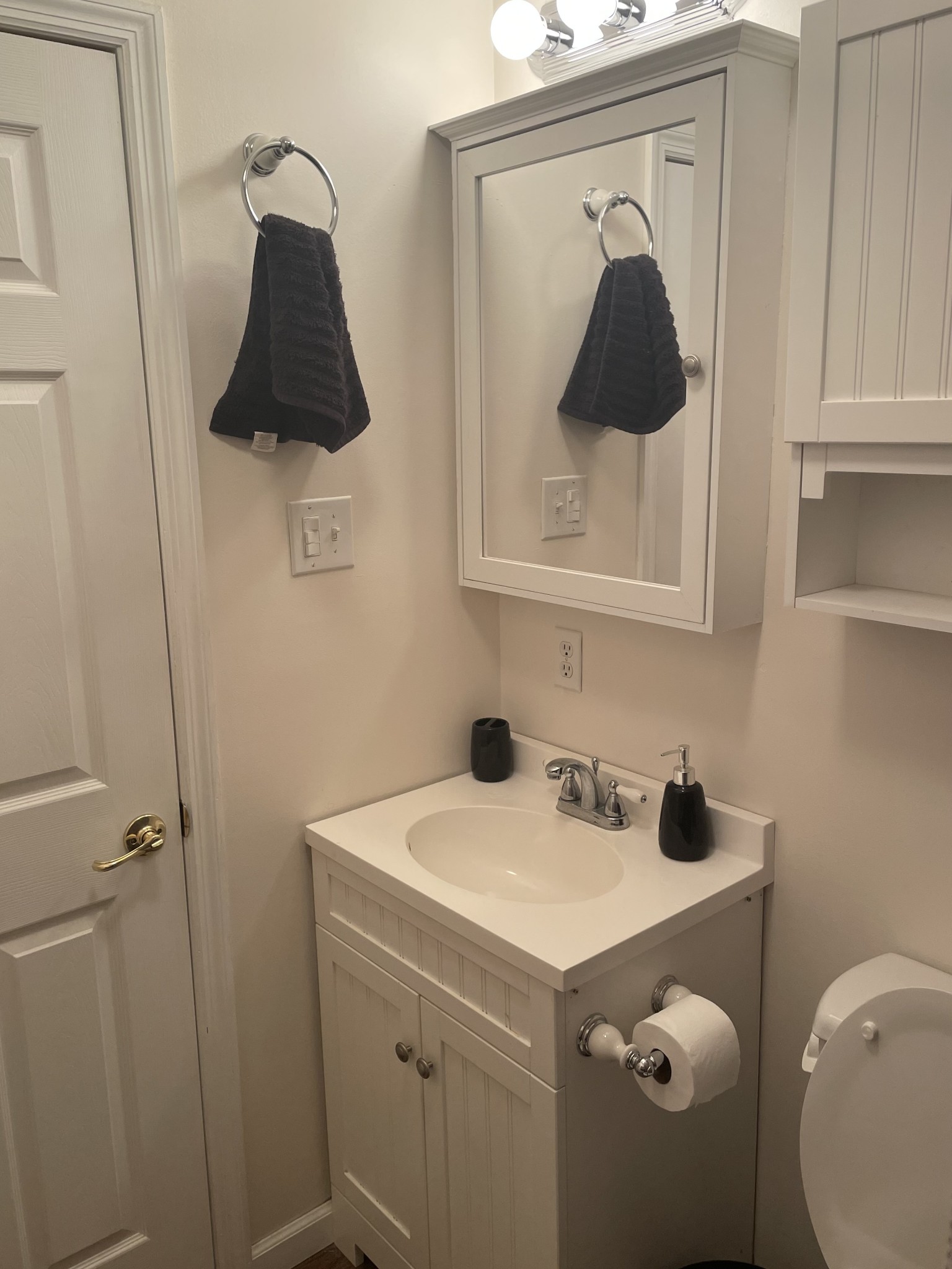 829 Dripping Springs Road Winchester, TN 37398 - Photo 20 of 32 a bathroom with a sink a toilet and vanity