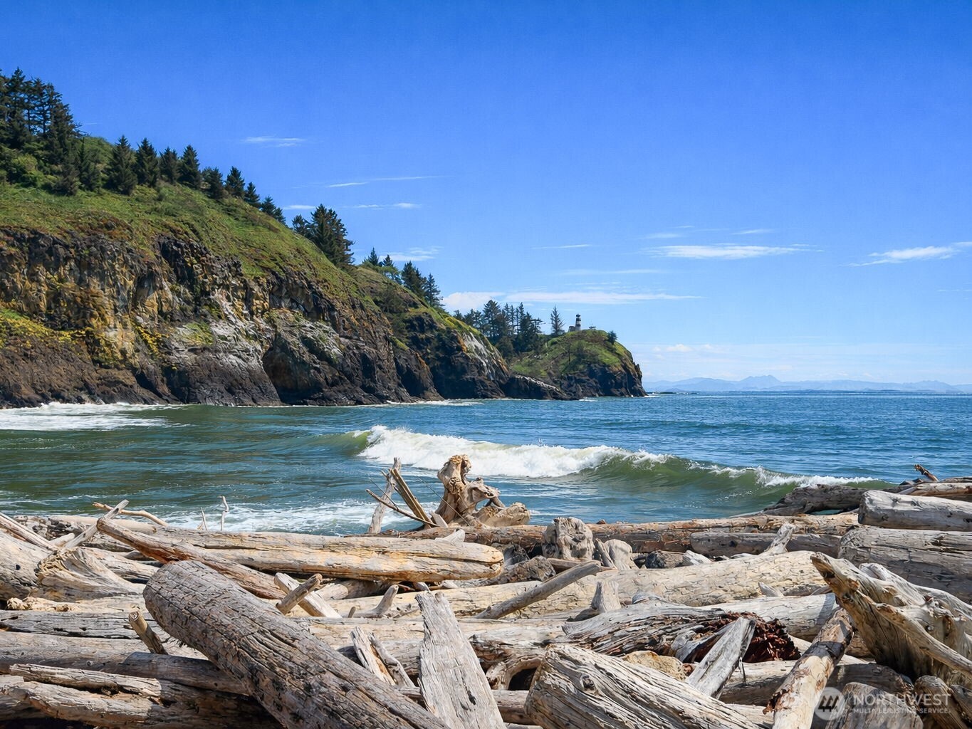 6 7th Street Southeast Long Beach, WA 98631 - Photo 21 of 23 a view of a lake with a yard