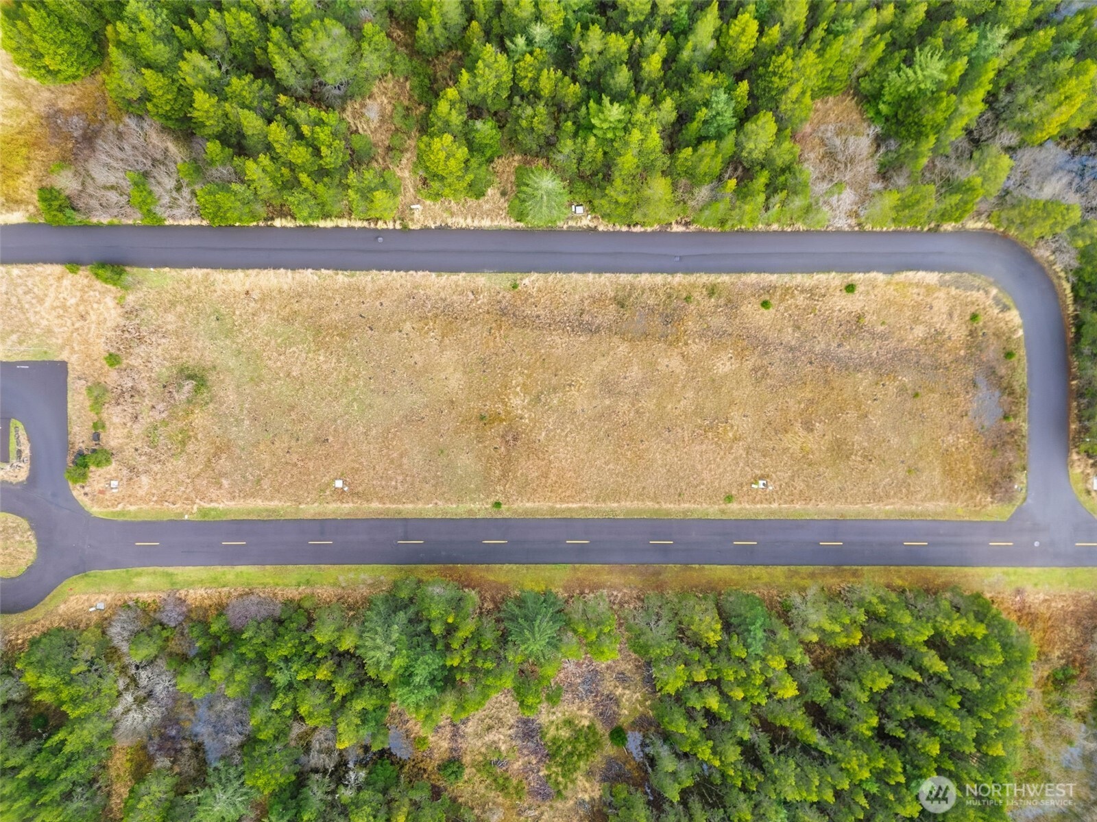 6 7th Street Southeast Long Beach, WA 98631 - Photo 10 of 23 a view of a field with an outdoor space