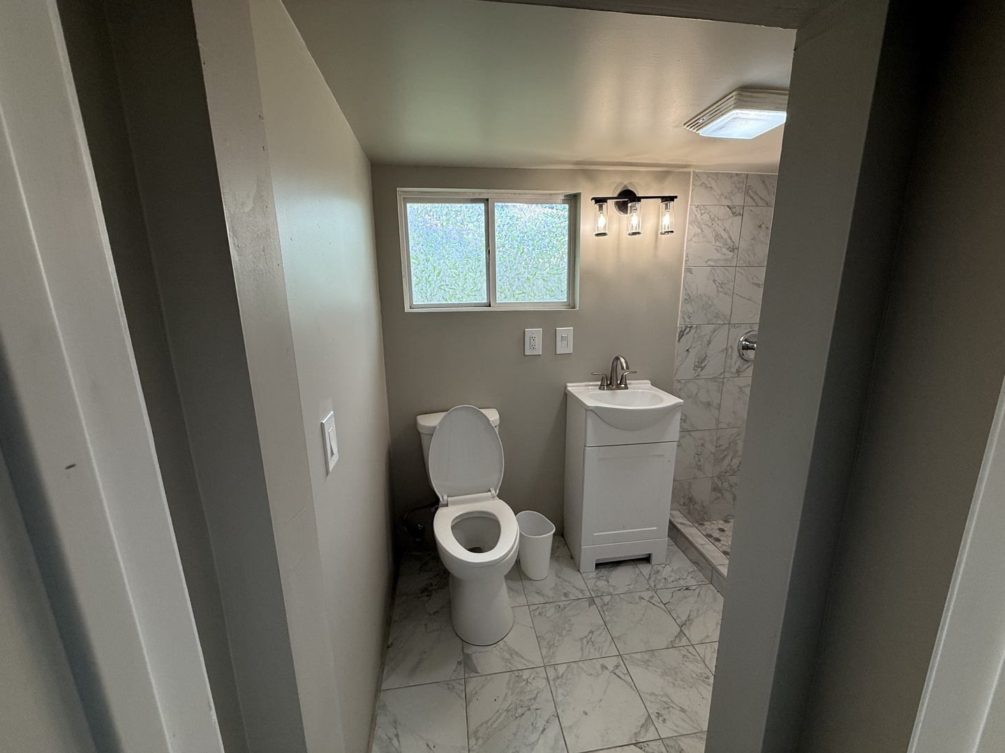 208 West Nippersink Road Round Lake, IL 60073 - Photo 21 of 32 a bathroom with a granite countertop toilet and a sink