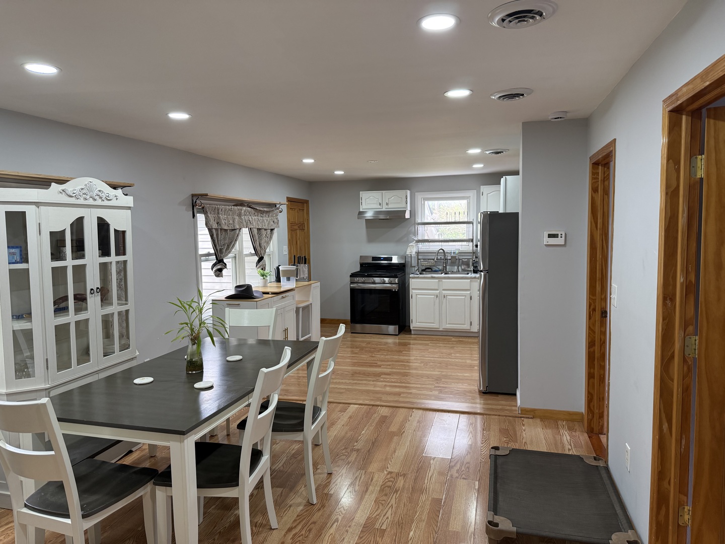 208 West Nippersink Road Round Lake, IL 60073 - Photo 3 of 32 a kitchen with stainless steel appliances granite countertop a refrigerator and a stove top oven