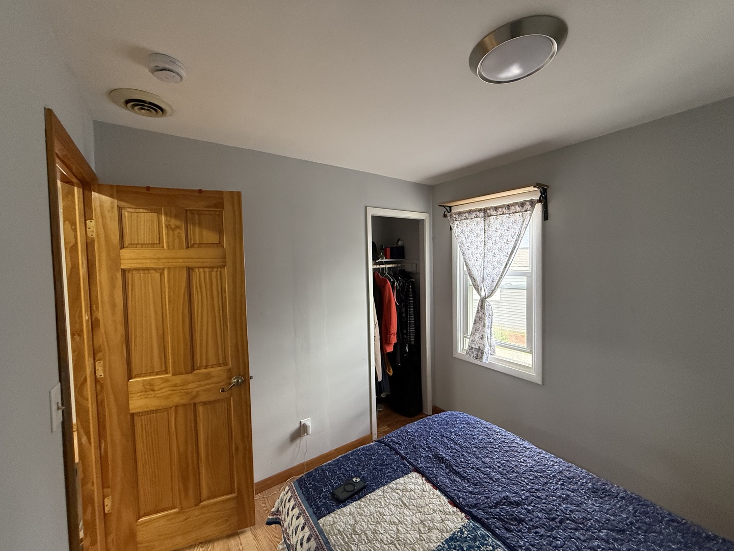 208 West Nippersink Road Round Lake, IL 60073 - Photo 8 of 32 a view of bedroom with window and hallway