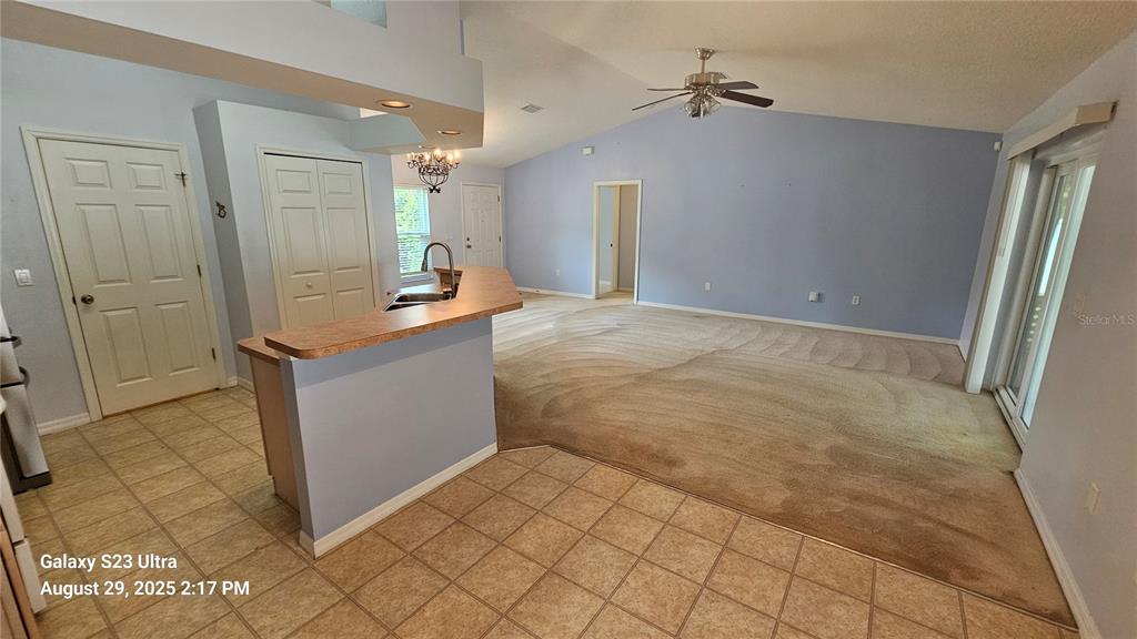 21 Lloleeta Path Palm Coast, FL 32164 - Photo 4 of 17 an empty room with kitchen view
