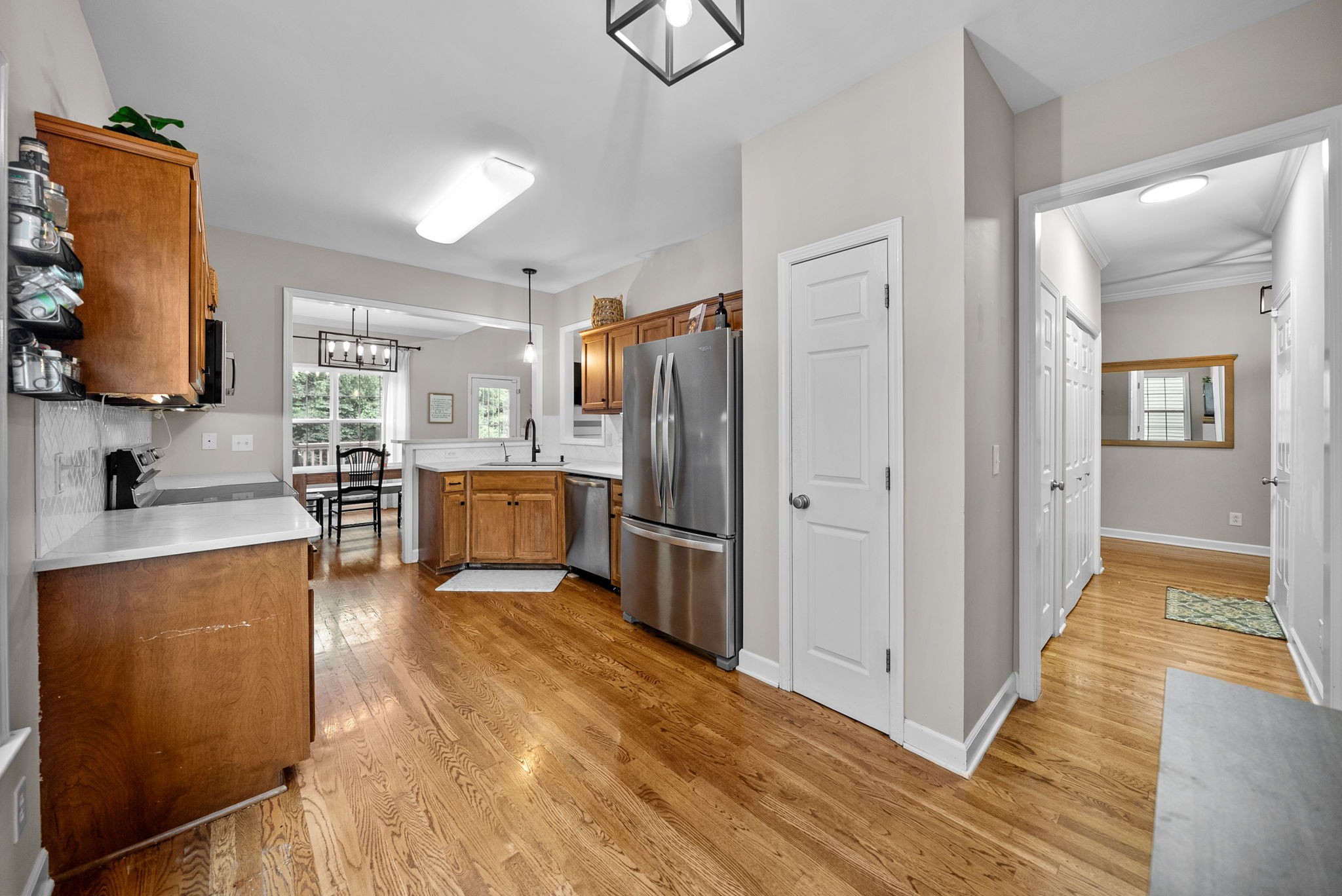 1161 Cynthia Lane Spring Hill, TN 37174 - Photo 12 of 42 a kitchen with stainless steel appliances granite countertop a refrigerator and a sink