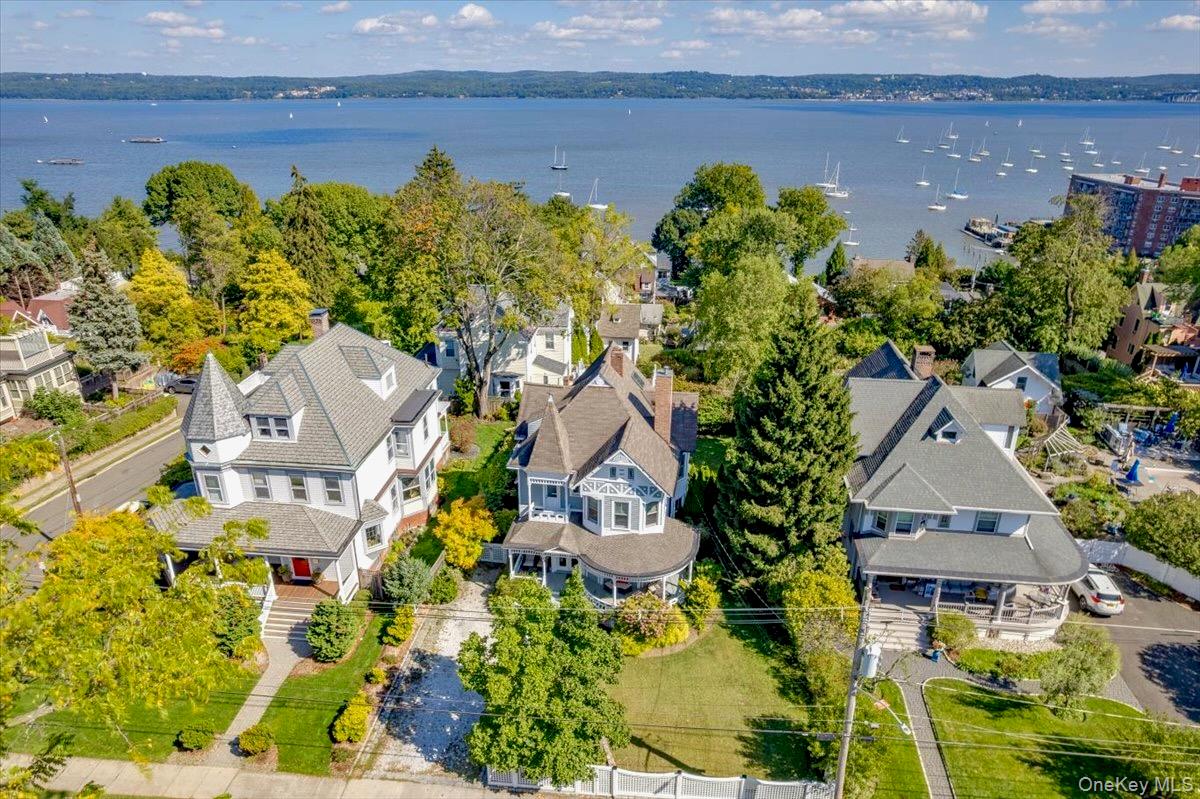 201 North Broadway Nyack, NY 10960 - Photo 2 of 36 an aerial view of multiple houses with yard