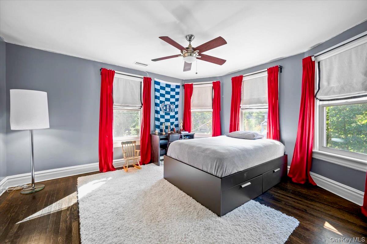 201 North Broadway Nyack, NY 10960 - Photo 25 of 36 a bed room with a bed and a window