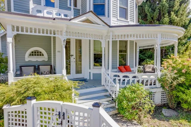 a front view of a building with garden