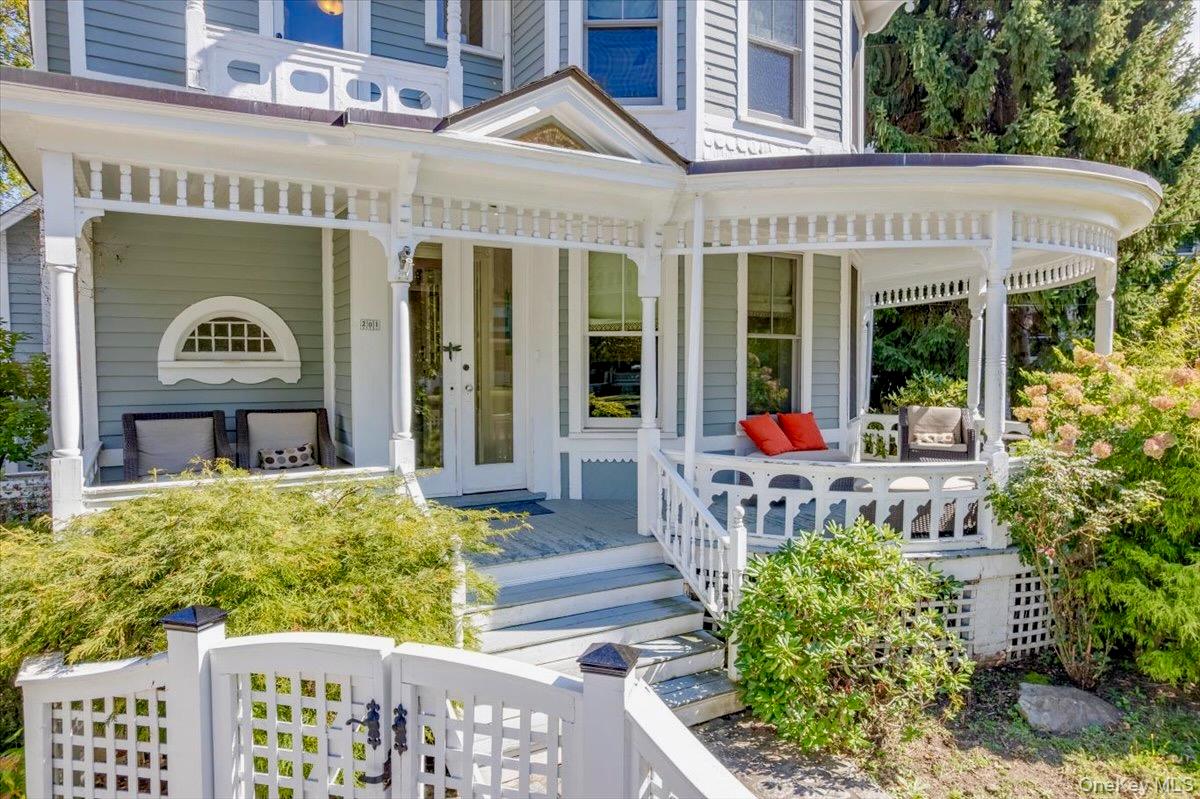 201 North Broadway Nyack, NY 10960 - Photo 3 of 36 a front view of a building with garden