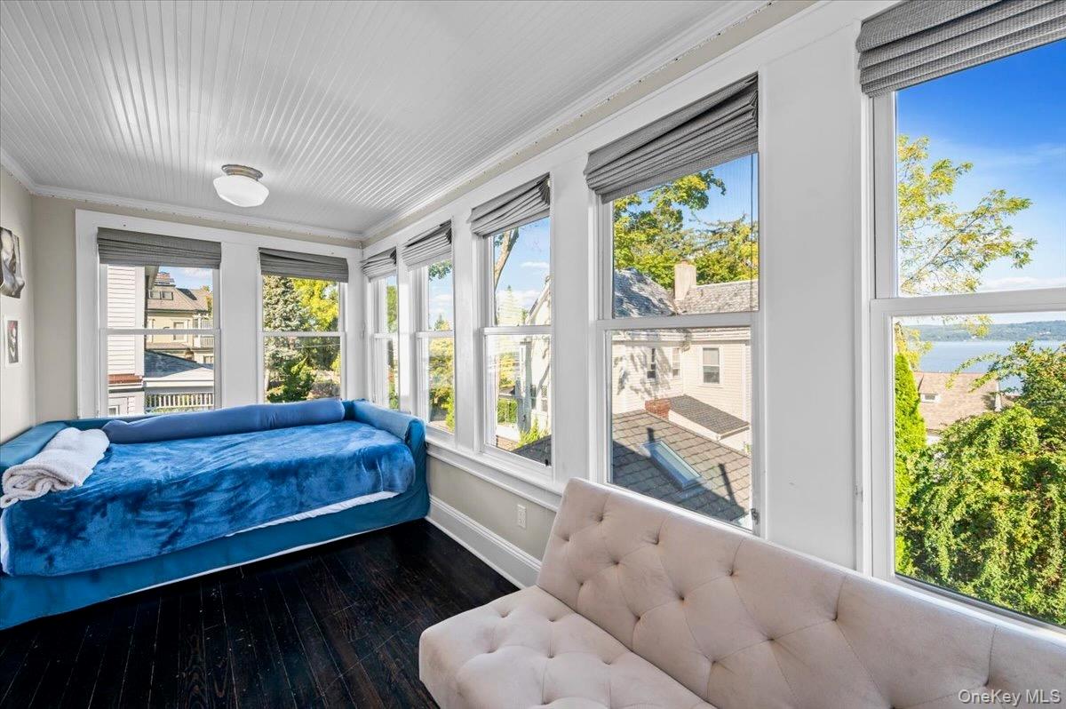 201 North Broadway Nyack, NY 10960 - Photo 32 of 36 a large bedroom with a bed and a window