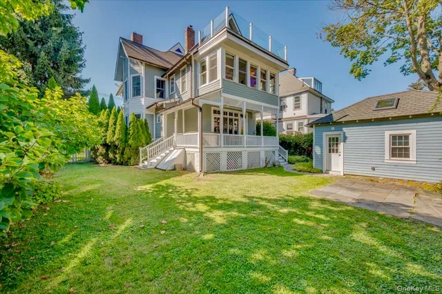 a backyard of a house with lots of green space