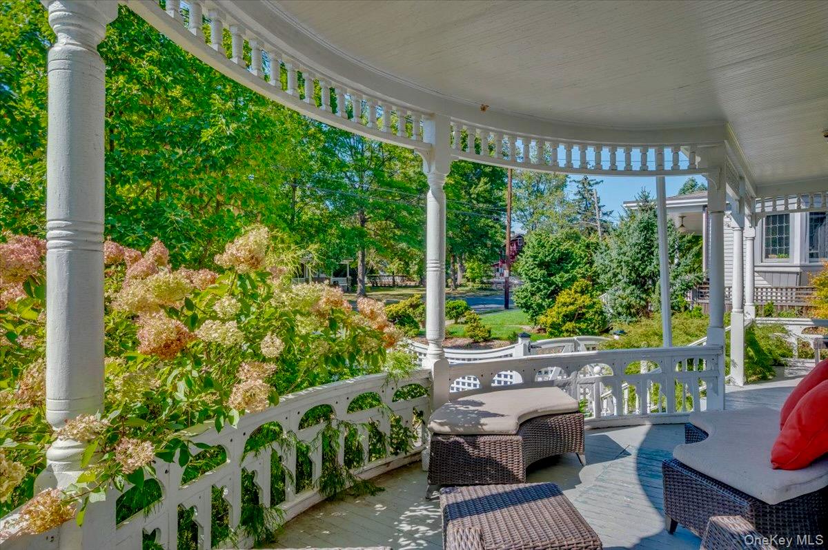 201 North Broadway Nyack, NY 10960 - Photo 5 of 36 a view of a patio with couches plants and wooden fence