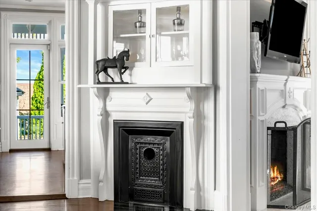 a view of a livingroom with furniture and a fireplace