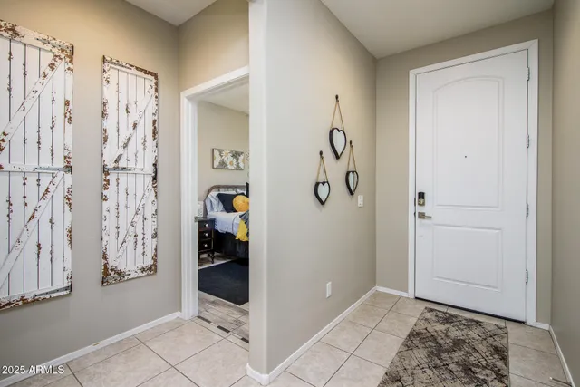 a bathroom with a sink a toilet and a window