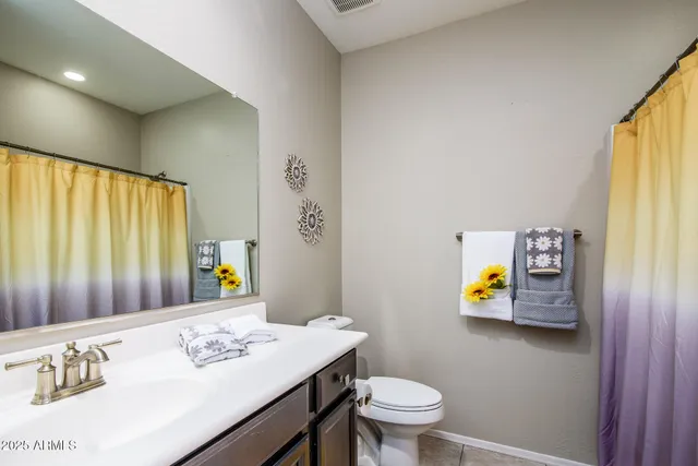 a view of a dining room with furniture and window