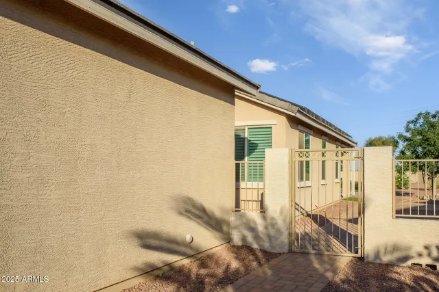 a view of a front door and wooden floor
