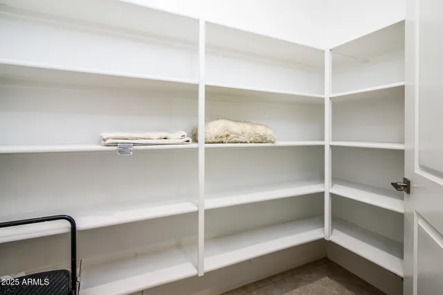 a front view of house with yard and outdoor seating