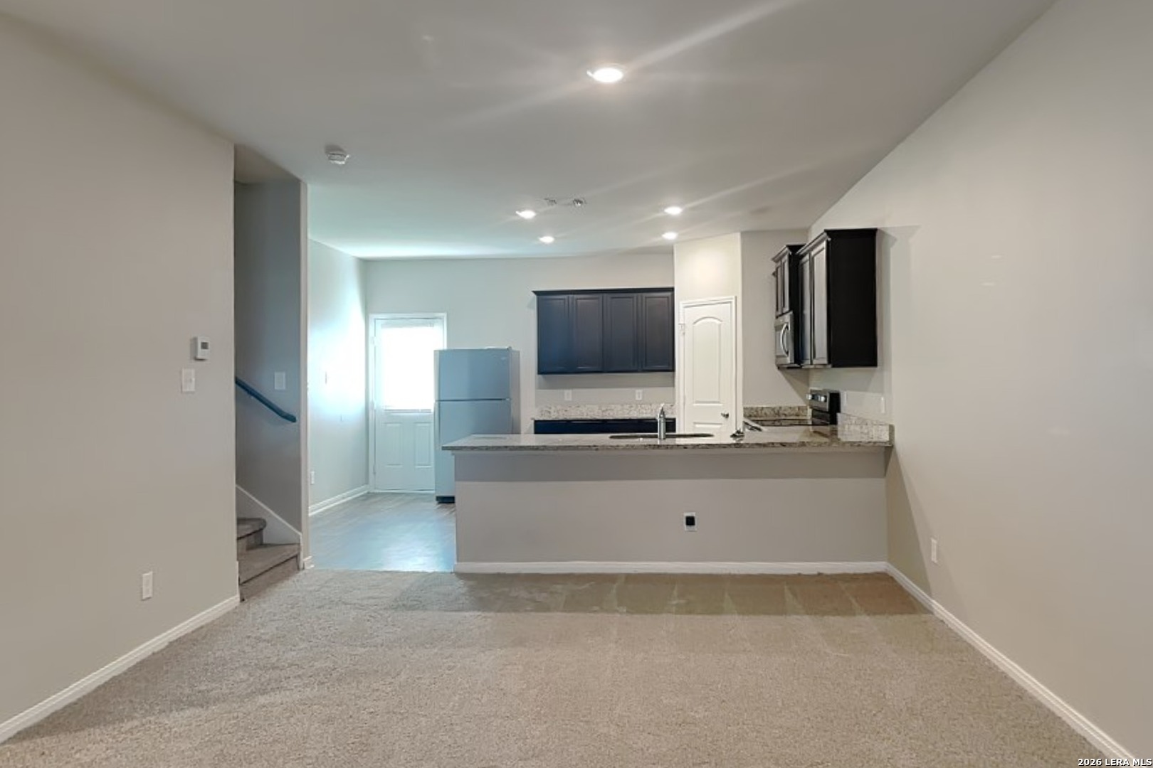 3022 Citron Garden Converse, TX 78109 - Photo 3 of 21 a living room with flat screen tv and a couch