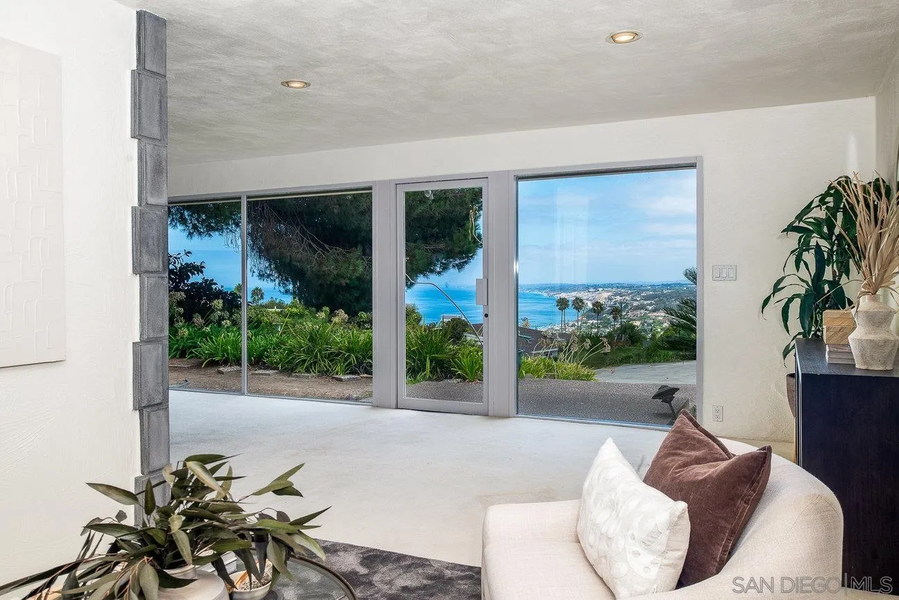 2349 Rue Adriane La Jolla, CA 92037 - Photo 14 of 36 a living room with furniture and a potted plant