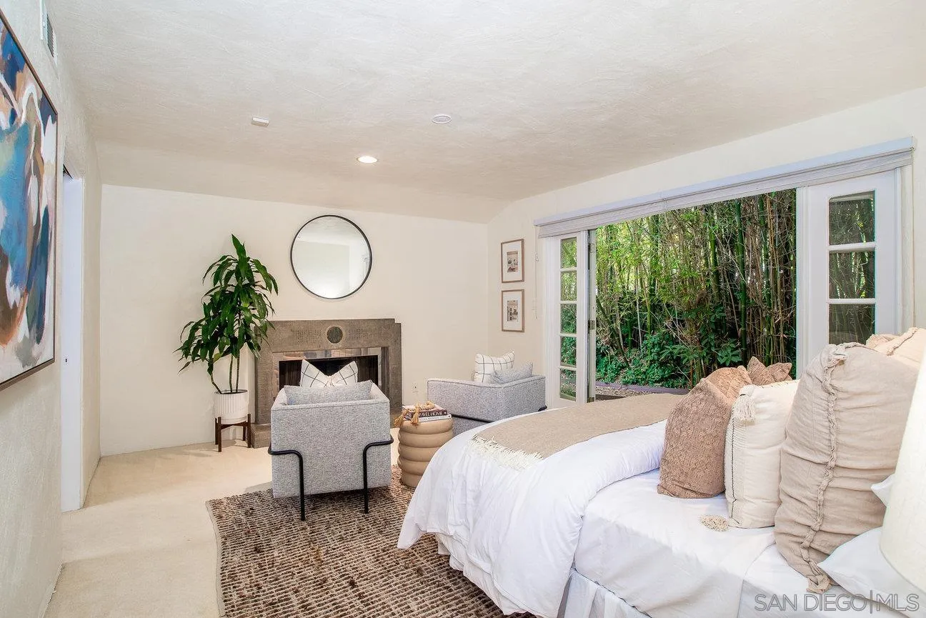 2349 Rue Adriane La Jolla, CA 92037 - Photo 18 of 36 a bedroom with bed and a large window