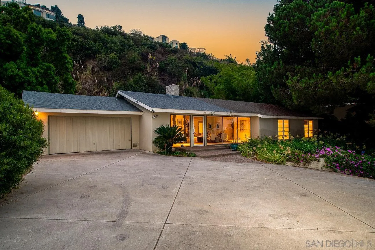 2349 Rue Adriane La Jolla, CA 92037 - Photo 2 of 36 a view of house with outdoor space and garden