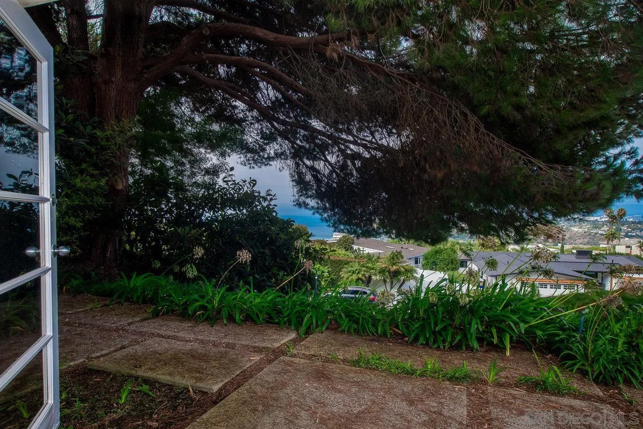 2349 Rue Adriane La Jolla, CA 92037 - Photo 26 of 36 a view of backyard with green space
