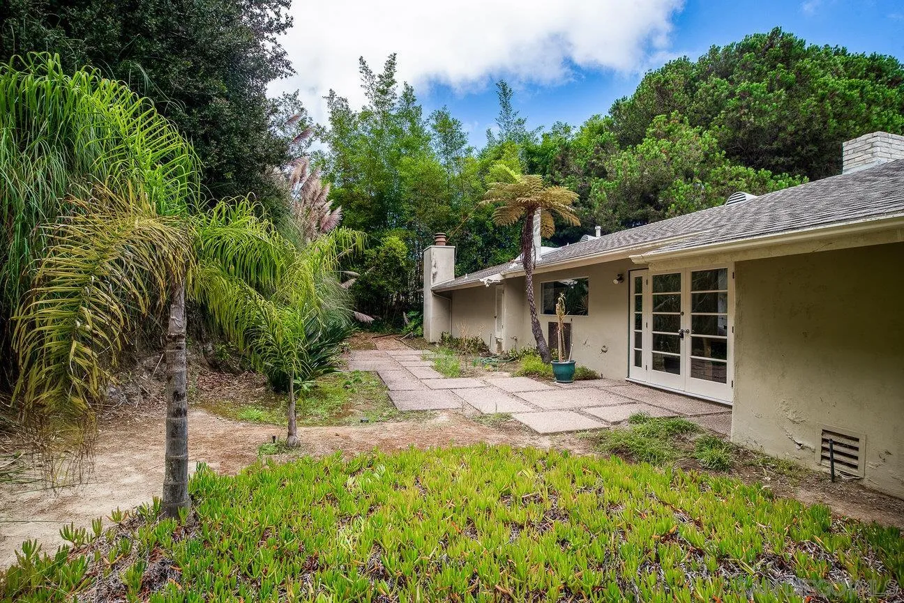 2349 Rue Adriane La Jolla, CA 92037 - Photo 29 of 36 a backyard of a house with seating space