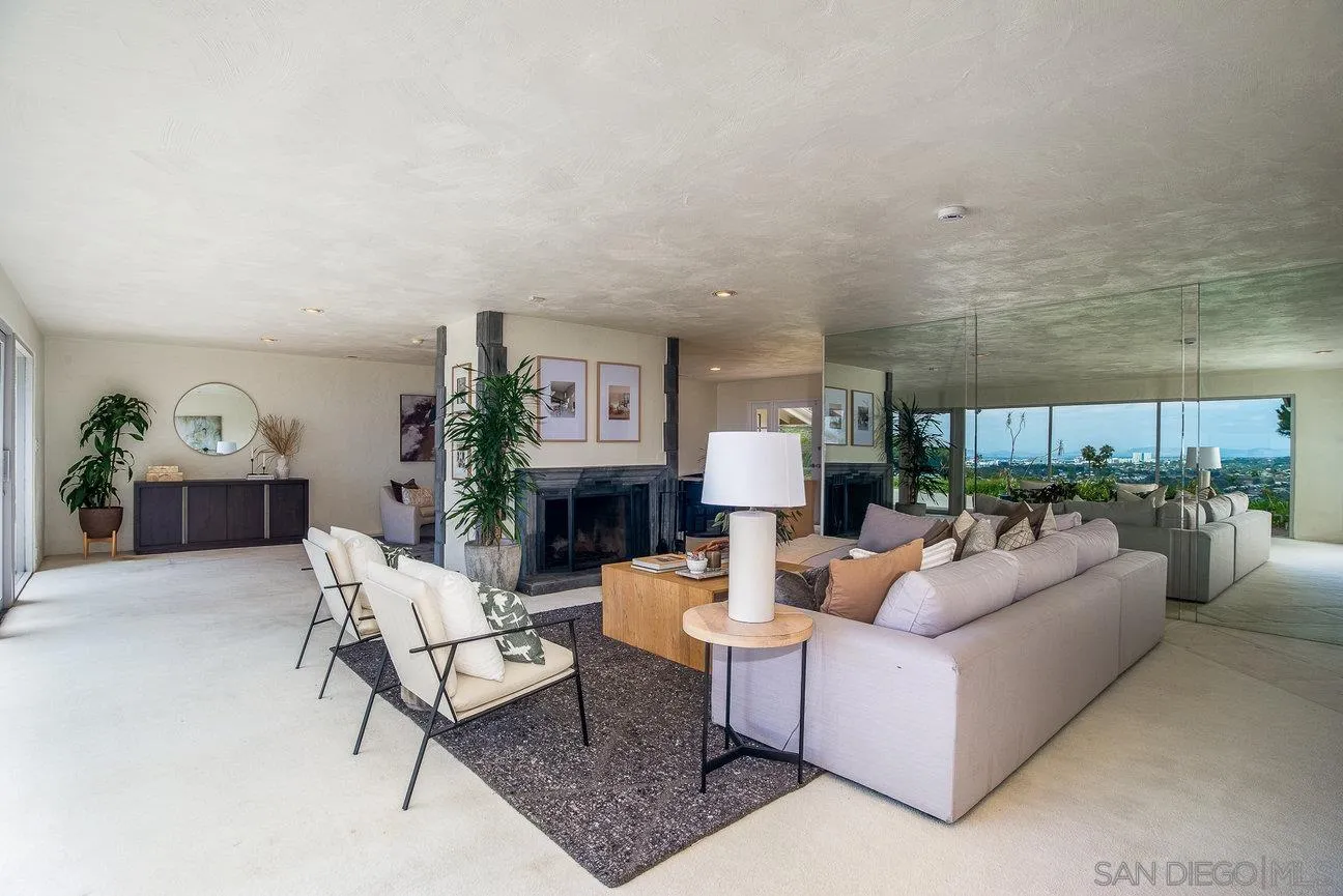 2349 Rue Adriane La Jolla, CA 92037 - Photo 7 of 36 a living room with furniture and a fireplace