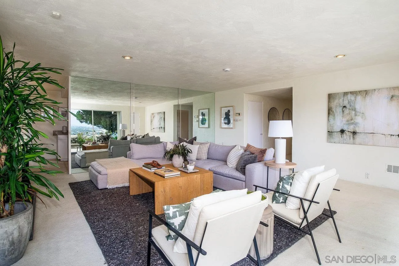 2349 Rue Adriane La Jolla, CA 92037 - Photo 8 of 36 a living room with furniture and a potted plant