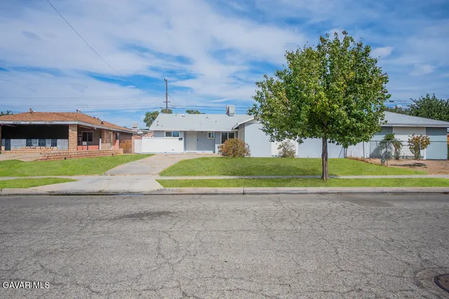 a view of a house with a swimming pool