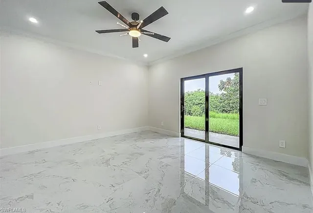 a kitchen with stainless steel appliances granite countertop a sink and refrigerator
