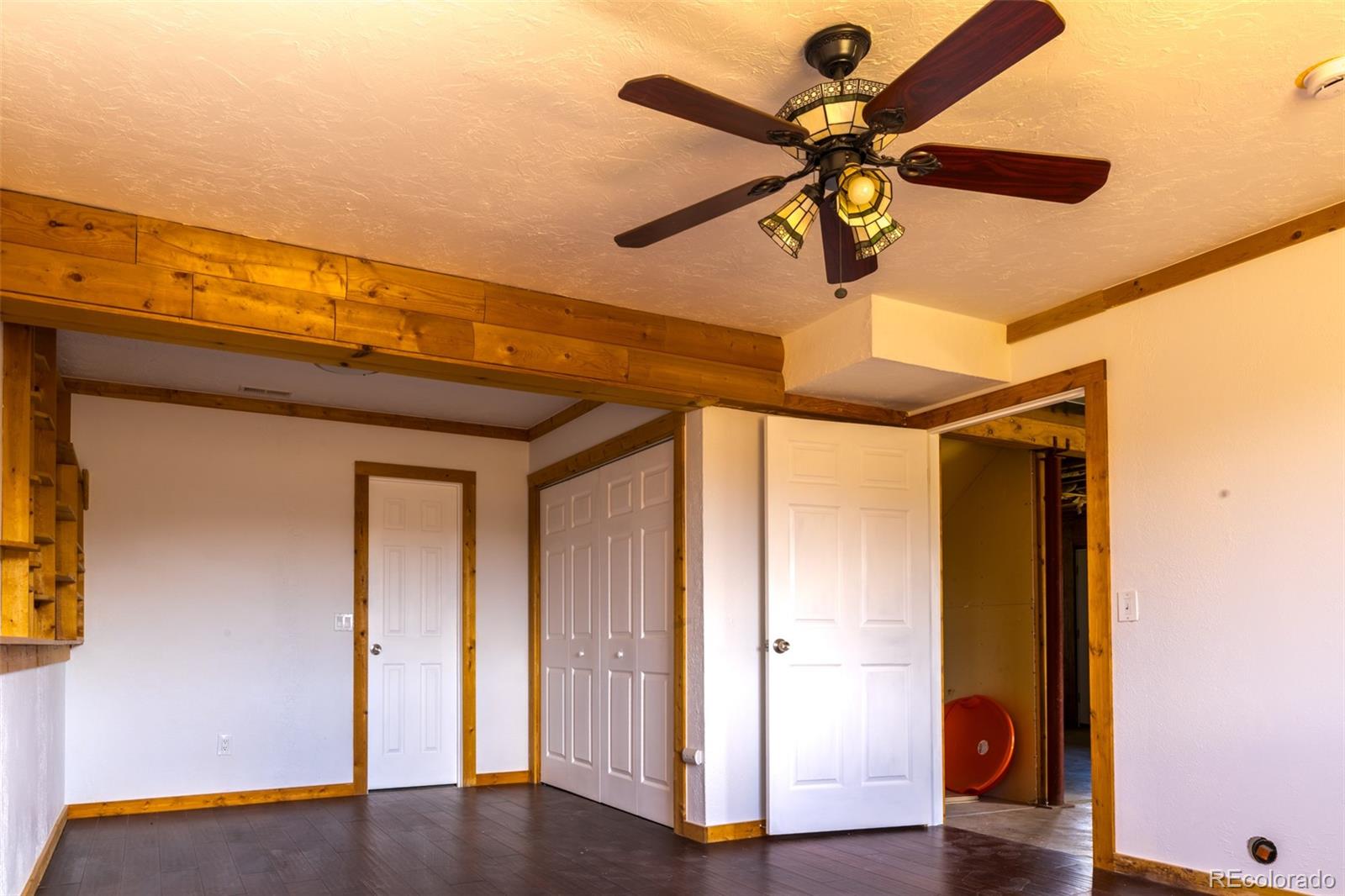 1155 Travois Road Jefferson, CO 80456 - Photo 25 of 31 a view of room with wooden floor