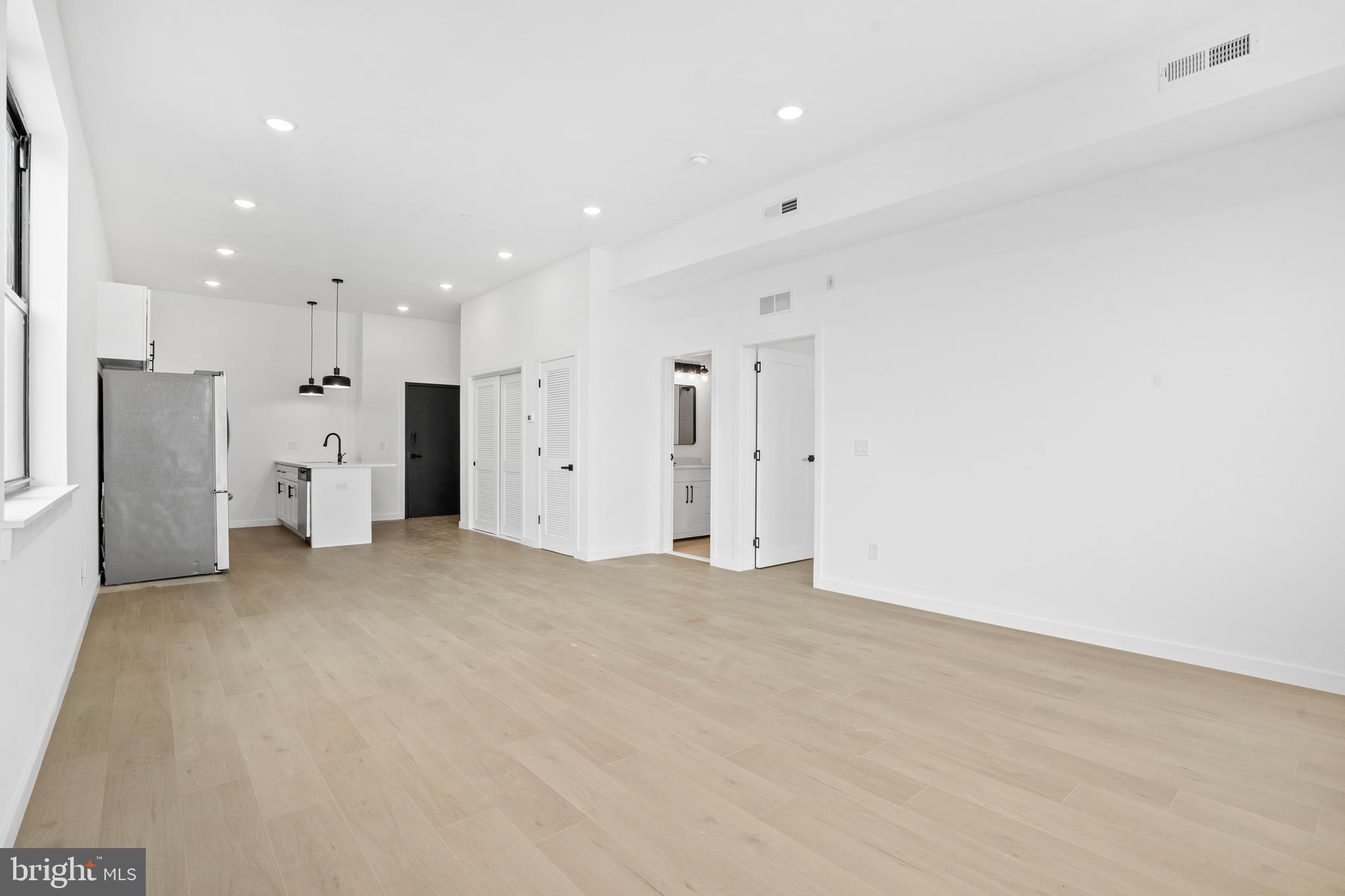 3211 Cedar Street, Unit 401 Philadelphia, PA 19134 - Photo 8 of 18 a view of an empty room